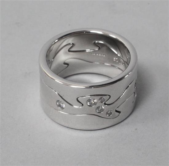 A modern Georg Jensen 18ct white gold and diamond set fusion ring, with Georg Jensen box, size H/K